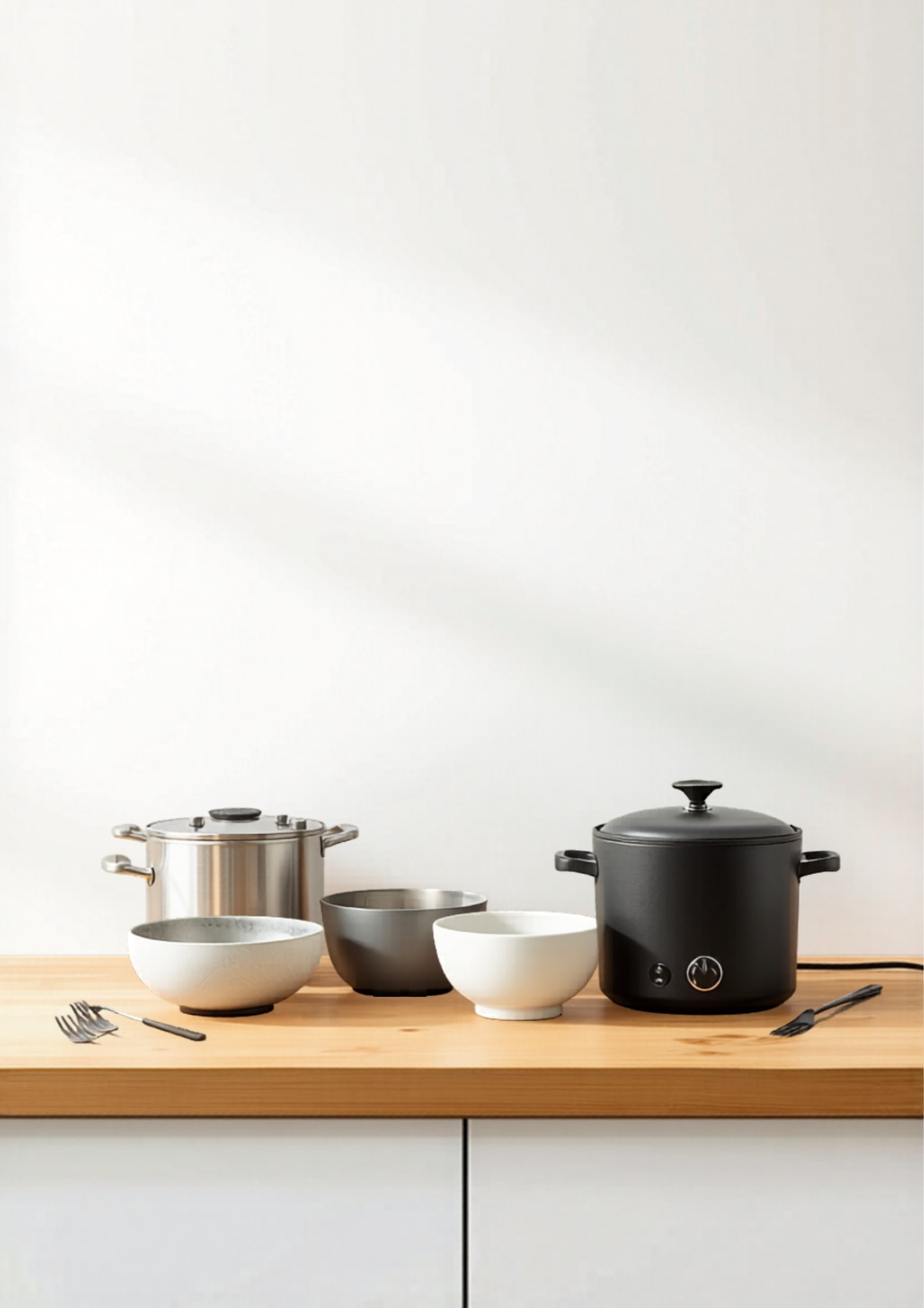 Fondue Pot Buyer's Guide: How to Choose the Right Pot 2 Fondue Pot Buyer's Guide — different fondue pot styles on kitchen counter